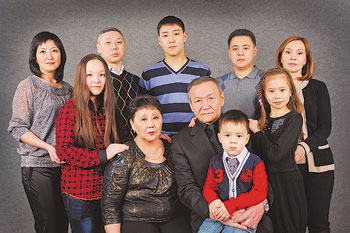Katima Sultanova (seated left) and her husband Tulegen Mussabekov (seated right) with their family. 1372263405